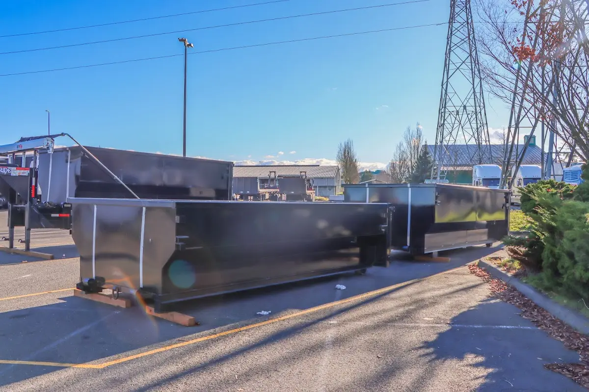 Roll-off dumpster ready for waste disposal at job site for Construction Dumpster Rental in Hanson